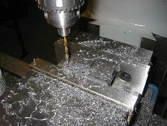  Drilling the holes for the hold-down bolts in the steam chest.
